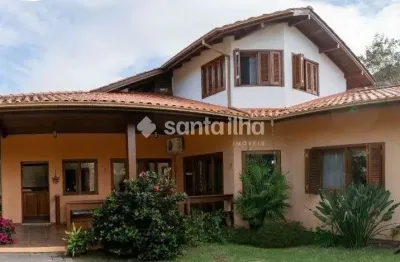 Casa em condomínio fechado com 5 quartos à venda na Rodovia Doutor Antônio Luiz Moura Gonzaga, 647, Rio Tavares, Florianópolis por R$ 5.440.000
