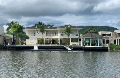 Casa em condomínio fechado com 6 quartos para alugar no Cidade Jardim Tom, Guarujá 
