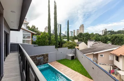 Casa nova com piscina aquecida no ecoville - 3 suítes - 4 vagas