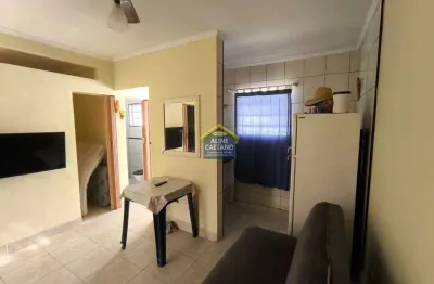 Casa de condomínio térrea com 1 dorm revertido para 2 dorms - lado praia e 1 vaga de garagem!