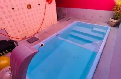 Casa térrea geminada com piscina e churrasqueira a carvão! financia!