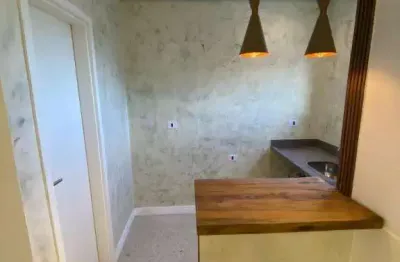 Linda kitnet toda reformada no centro do boqueirão e à 100 mts da praia! financia!