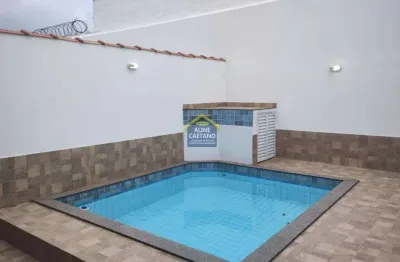 Linda casa térrea geminada lado praia com piscina e churrasqueira a carvão!