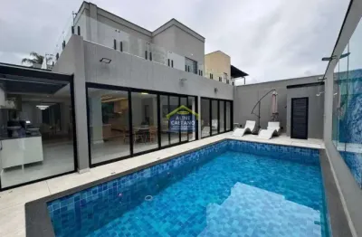 Espetáculo sobrado no canto do forte - 3 suítes, espaço gourmet e piscina!!