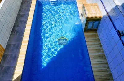 Espaçosa casa geminada 2 quartos à venda no mirim, praia grande