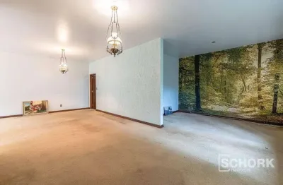 Casa contendo 3 dormitórios, sendo 2 suítes, a 5min do centro de blumenau, com terreno de 1.000m²