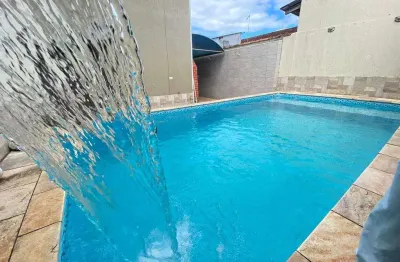 Encantadora residência de 3 quartos com suíte e área de lazer