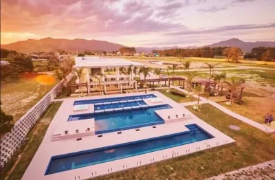 Terreno em condomínio fechado à venda na sc 434, 975, campo d'una, imbituba, 450 m2 por r$ 490.000