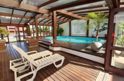 Casa com 5 quartos à venda na atlantica, 2301, centro, tramandaí, 518 m2 por r$ 3.500.000