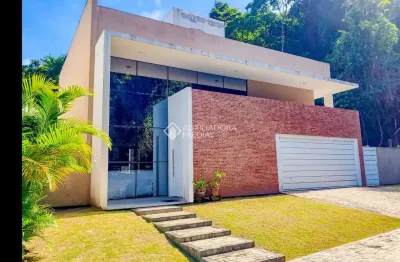 Casa em condomínio fechado com 3 quartos à venda na Avenida Luiz Boiteux Piazza, 4730, Cachoeira do Bom Jesus, Florianópolis, 244 m2 por R$ 2.500.000