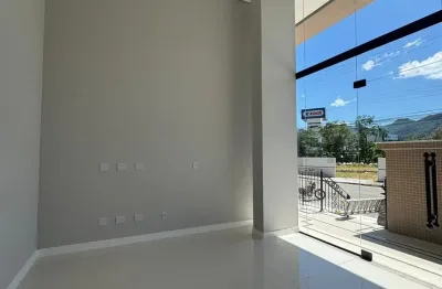 Sala comercial frente avenida  no centro de itapema com vaga de garagem