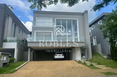 Casa de condomínio com 430 m², 4 quartos sendo 4 suítes à venda no bairro Alphaville.