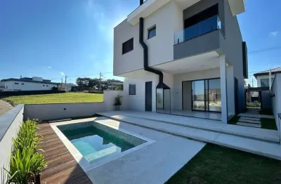 Imperdível! casa em condomínio à venda em caçapava-sp, 3 quartos, 1 suíte, 4 vagas de garagem, 263m².