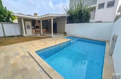 Oportunidade - Sobrado com 263m² de área privativa e com piscina no Campos do Conde Versailles em Tremembé-SP