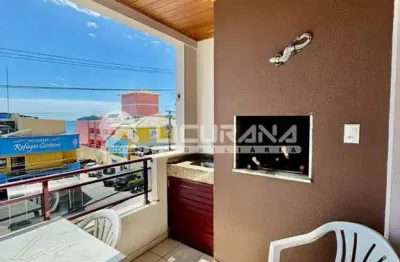 Apartamento com 03 dormitórios, com vista parcial mar, localizado na avenida principal do centro de bombinhas/sc