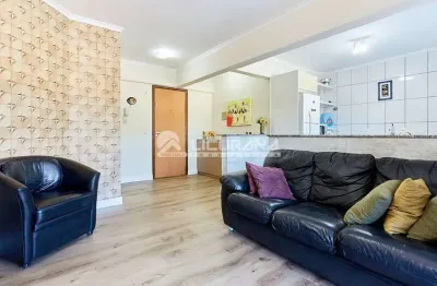 Oportunidade de investimento - apartamento na praia do centro de bombinhas à 150 metros do mar, mobiliado e com garagem.