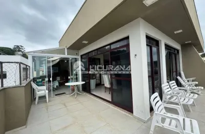 Singular cobertura plana com vista mar, com 04 dormitórios, e 05 garagens a venda na praia do centro de bombinhas/sc