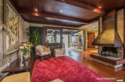 Casa em condomínio fechado com 5 quartos à venda na rua josé otávio manica, 40, santa tereza, porto alegre, 442 m2 por r$ 1.500.000