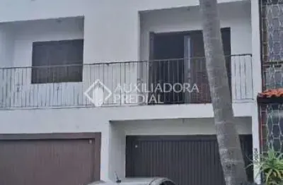 Casa com 3 quartos à venda na rua ângelo passuelo, 390, vila nova, porto alegre, 262 m2 por r$ 750.000