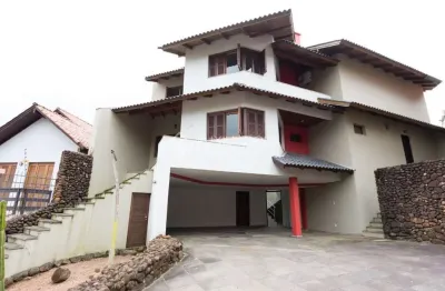 Casa em condomínio fechado com 4 quartos à venda na rua josé otávio manica, 230, santa tereza, porto alegre, 390 m2 por r$ 1.710.000