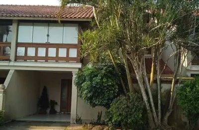 Casa em condomínio fechado com 4 quartos à venda na avenida eduardo prado, 2050, cavalhada, porto alegre, 300 m2 por r$ 1.300.000