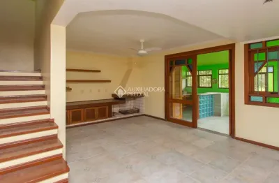 Casa com 3 quartos à venda na rua augusto lourenço martins, 110, vila nova, porto alegre, 185 m2 por r$ 530.000