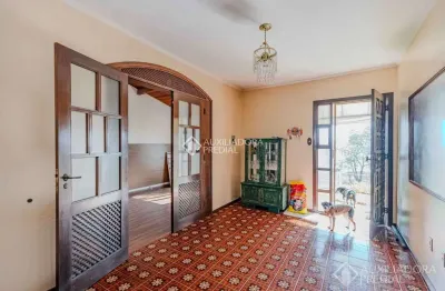 Casa com 4 quartos à venda na acesso das palmeiras, 100, santa tereza, porto alegre, 133 m2 por r$ 549.000