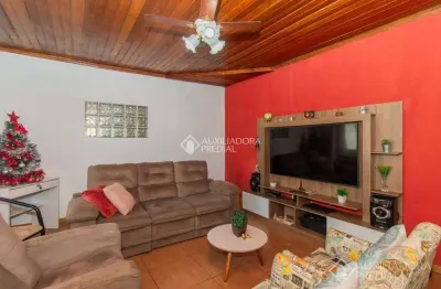 Casa com 2 quartos à venda na rua ângelo passuelo, 480, vila nova, porto alegre, 102 m2 por r$ 299.000