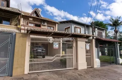Casa em condomínio fechado com 3 quartos à venda na avenida copacabana, 133, tristeza, porto alegre, 197 m2 por r$ 1.300.000