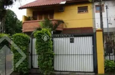 Casa em condomínio fechado com 3 quartos à venda na rua mura, 120, guarujá, porto alegre, 154 m2 por r$ 600.000