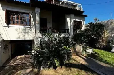 Casa com 4 quartos à venda na rua butuí, 173, cristal, porto alegre, 376 m2 por r$ 950.000