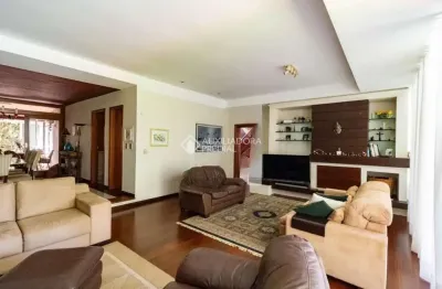 Casa com 3 quartos à venda na rua guato, 111, vila assunção, porto alegre, 460 m2 por r$ 2.500.000