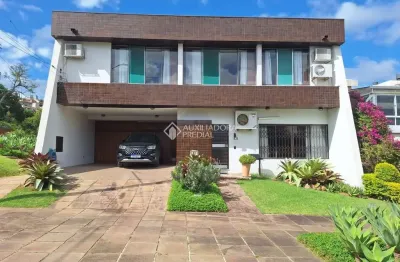 Casa em condomínio fechado com 3 quartos à venda na rua sinke, 236, santa tereza, porto alegre, 250 m2 por r$ 1.425.000