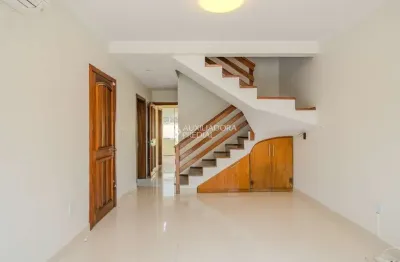 Casa em condomínio fechado com 3 quartos à venda na avenida orleaes, 105, guarujá, porto alegre, 207 m2 por r$ 650.000