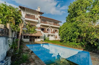 Casa com 4 quartos à venda na rua pareci, 206, vila assunção, porto alegre, 519 m2 por r$ 2.300.000