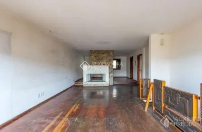 Casa em condomínio fechado com 3 quartos à venda na avenida josé gertum, 394, chácara das pedras, porto alegre, 294 m2 por r$ 1.200.000