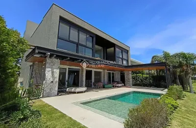 Casa em condomínio fechado com 5 quartos à venda na central, 2500, atlântida, xangri-lá, 487 m2 por r$ 5.200.000