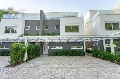 Casa em condomínio fechado com 3 quartos à venda na rua doutor ney de castilhos ferreira, 300, pedra redonda, porto alegre, 340 m2 por r$ 2.750.000