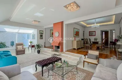 Casa com 6 quartos à venda na rua de souza júnior, 103, medianeira, porto alegre, 365 m2 por r$ 1.800.000