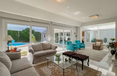 Casa com 6 quartos à venda na rua de souza júnior, 103, medianeira, porto alegre, 365 m2 por r$ 1.800.000