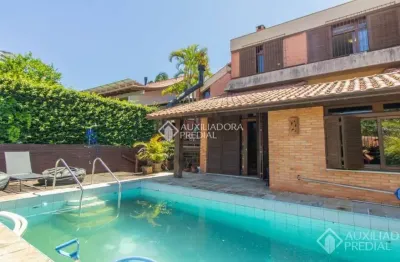 Casa com 4 quartos à venda na rua senador annibal di primio beck, 280, boa vista, porto alegre, 265 m2 por r$ 1.890.000