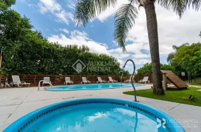 Casa em condomínio fechado com 3 quartos à venda na rua erechim, 100, nonoai, porto alegre, 190 m2 por r$ 693.500