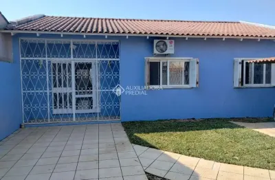 Casa em condomínio fechado com 3 quartos à venda na rua carlos gomes, 215, harmonia, canoas, 110 m2 por r$ 600.000