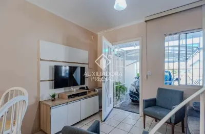 Casa em condomínio fechado com 2 quartos à venda na avenida juca batista, 3527, hípica, porto alegre, 49 m2 por r$ 240.000