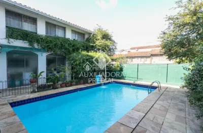 Casa com 4 quartos à venda na rua josé antônio aranha, 324, três figueiras, porto alegre, 241 m2 por r$ 2.000.000
