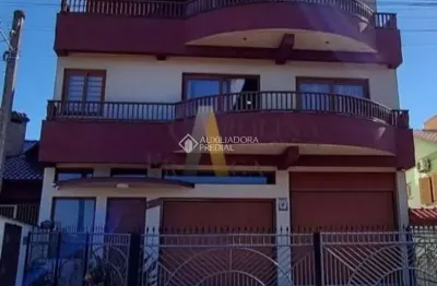 Casa com 5 quartos à venda na doutor joão beckel, 1055, hípico, camaquã, 576 m2 por r$ 1.700.000