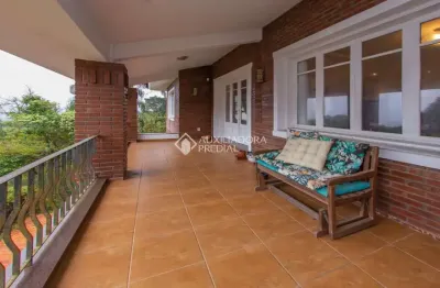 Casa com 4 quartos à venda na rua deputado astério de mello, 415, teresópolis, porto alegre, 359 m2 por r$ 1.720.000