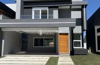 Casa em condomínio fechado com 3 quartos à venda na avenida senador salgado filho, 8500, querência, viamão, 271 m2 por r$ 1.925.000