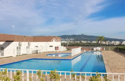 Casa em condomínio fechado com 3 quartos à venda na acesso terra nova, 502, terra nova, alvorada, 45 m2 por r$ 240.000