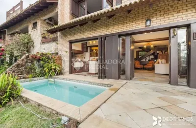 Casa em condomínio fechado com 3 quartos à venda na rua carlos júlio becker, 295, tristeza, porto alegre, 421 m2 por r$ 2.240.000